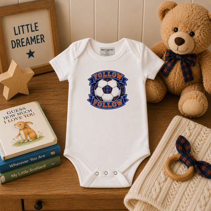 FOLLOW FOLLOW baby bodysuit displayed with teddy bear and baby accessories