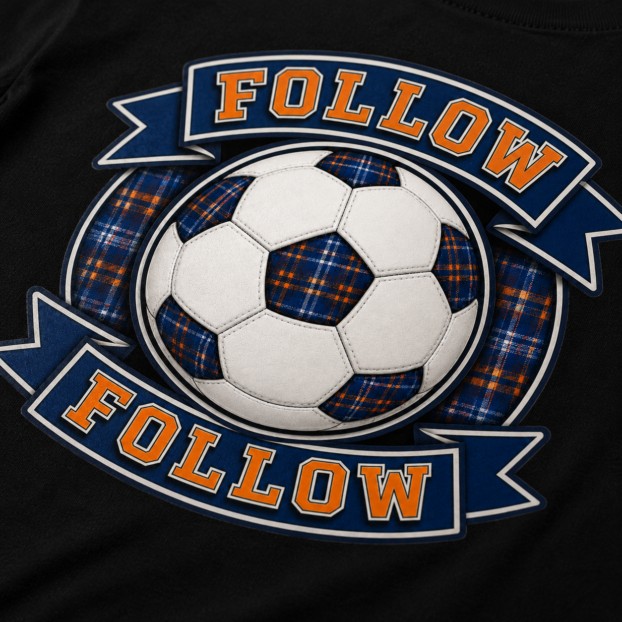 Close-up of the FOLLOW FOLLOW football-inspired back print featuring a football, tartan pattern, supporter banners and embroidered-style detailing.