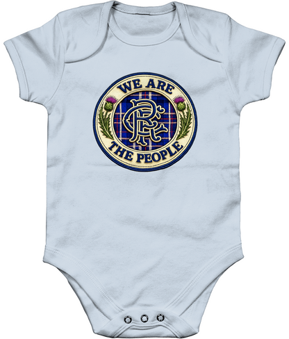 We Are The People badge baby bodysuit in pastel blue featuring tartan crest design