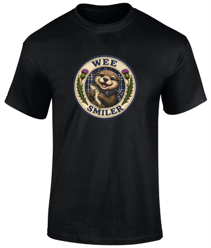 Wee Smiler youth t-shirt in black featuring a smiling otter crest holding a fish with tartan and thistle details.