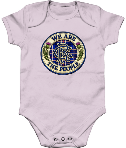 We Are The People badge baby bodysuit in pastel pink featuring tartan crest design