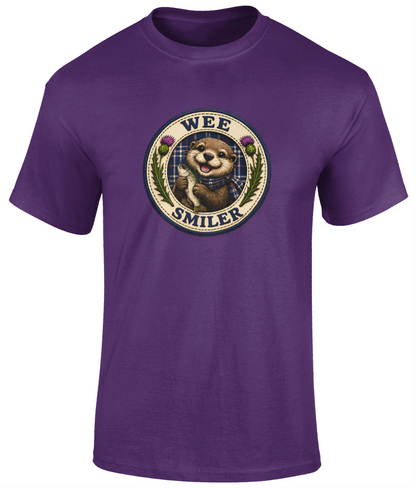Wee Smiler youth t-shirt in purple featuring a smiling otter crest holding a fish with tartan and thistle details.